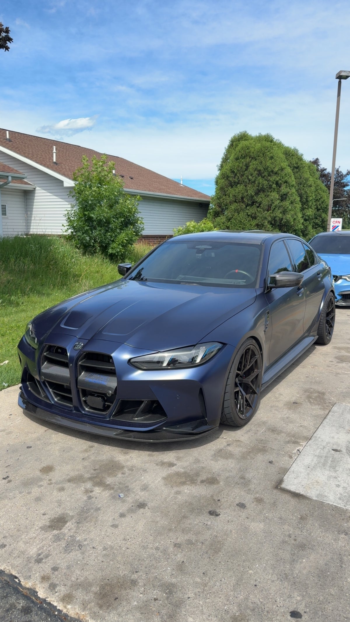 Customer's BMW with StackedCarbon carbon fiber front lip